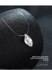 Détail du pendentif en cristal marquise sur fil invisible avec placage en argent