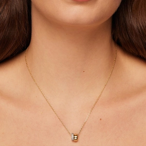 Elegant gold S925 silver double circle necklace featuring moissanite pavé and polished rings