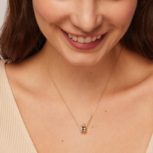 Elegant gold S925 sterling silver double circle moissanite necklace on a female neck
