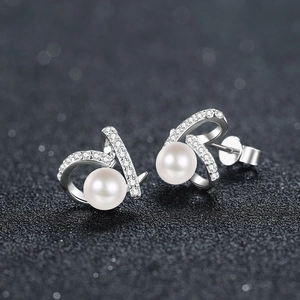 Elegant S925 sterling silver pearl earrings with sparkling moissanite curved accents