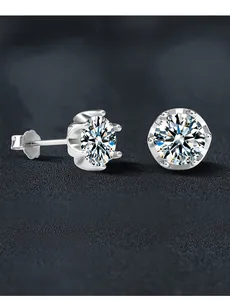 Detail of 3EX cut moissanite earrings showing 58 facets for maximum fire and brilliance