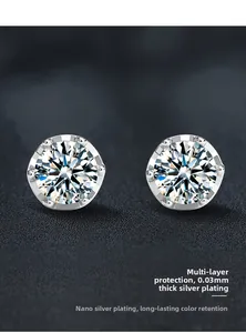 Detailed macro of six-prong D color moissanite studs with 0.03mm silver plating