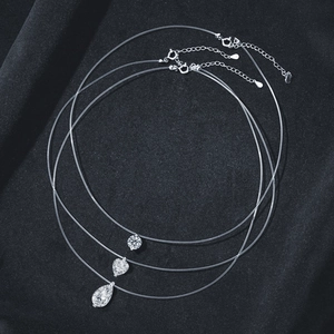 S925 sterling silver invisible fishline necklace with round, heart and teardrop pendants