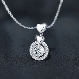 Sparkling S925 sterling silver heart necklace with a dancing moissanite pendant