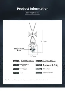 Macro view of S925 silver bell pendant with bow detail and moissanite stone measurements