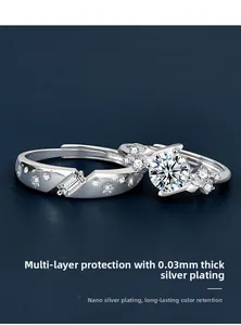 Macro view of S925 sterling silver couple rings with moissanite and star detail