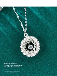 Macro shot of S925 sterling silver dreamcatcher necklace with a dancing moissanite stone