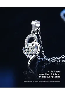Macro detail of S925 silver love heart pendant with moissanite and nano plating