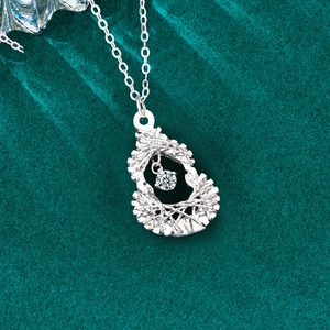 S925 sterling silver dreamcatcher gourd necklace with moissanite pendant on green velvet