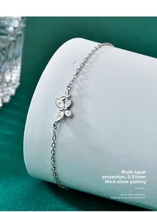 Macro detail of silver butterfly bracelet with marquise zircon and nano-plating technology