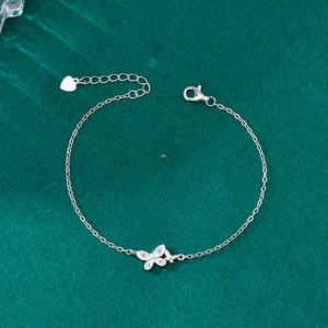 S925 sterling silver butterfly bracelet with marquise stones on green velvet