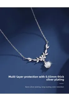 Macro view of S925 silver necklace showing 0.03mm nano-plating and flower pendant detail