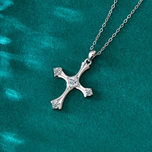 S925 Sterling Silver Cross Necklace with Princess Cut Moissanite Pendant on Blue Background