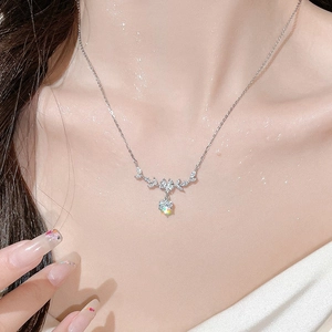 Moissanite S925 silver wheat necklace with sparkling flower pendant on a model