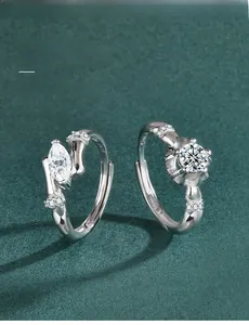 Detail of S925 sterling silver couple rings showing S925 hallmark and adjustable bands