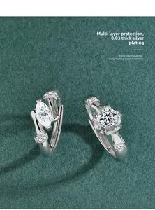 Close-up of S925 silver rings showing 0.03mm nano silver plating and moissanite detail