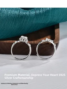 Detail of S925 sterling silver crown ring set with moissanite on dark wood tray