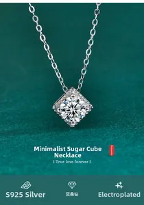 Macro shot of S925 sterling silver sugar-cube pendant featuring a brilliant moissanite stone