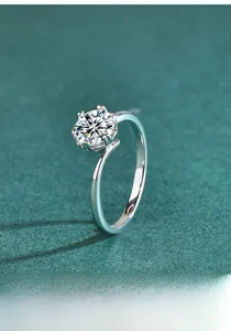 Macro shot of S925 sterling silver twisted band ring with classic six-prong moissanite