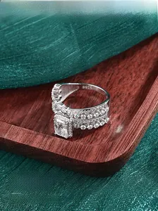 Detail of S925 sterling silver stamp and double-row pavé setting on a luxury ring