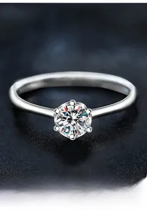 Macro shot of 0.5ct moissanite ring with classic six-prong setting on S925 silver band