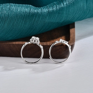 S925 sterling silver moissanite couple ring set with crown setting on wooden tray