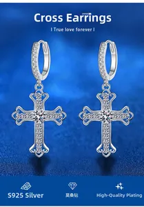Detail of S925 silver cross earrings with moissanite stones and vintage floral edges