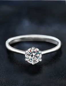 Macro shot of 0.5ct moissanite ring with classic six-prong setting and 3EX cut details