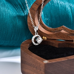 S925 sterling silver moon and star necklace with moissanite pendant in a heart-shaped box