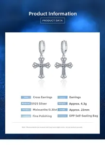 Macro shot of 925 sterling silver cross earrings featuring 0.3ct moissanite stones