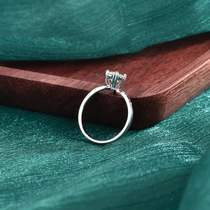 Classic S925 sterling silver snowflake ring with 6-prong moissanite on silk background