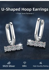 Macro detail of S925 sterling silver U-shaped earrings with five moissanite diamonds
