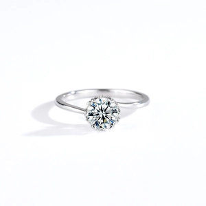 Elegant S925 sterling silver snowflake ring with a round moissanite in a bypass setting