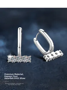 Detailed view of U-shaped S925 sterling silver earrings with round moissanite inlay
