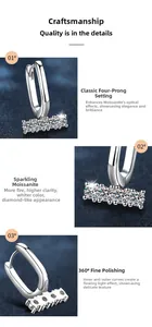 Detailed macro view of S925 silver U-shaped moissanite earrings with four-claw setting