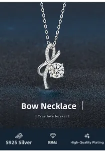 Macro detail of S925 silver bow pendant necklace with sparkling moissanite stone