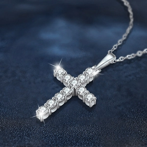 Elegant 925 sterling silver cross pendant necklace featuring shimmering moissanite stones