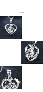 Détail macro du pendentif coeur en moissanite avec monture quatre griffes en argent 925