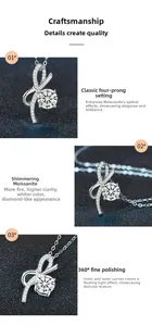 Macro detail of S925 sterling silver bow pendant featuring a four-claw set Moissanite stone