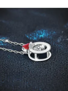 Macro detail of S925 silver Christmas pendant necklace with sparkling round zircon