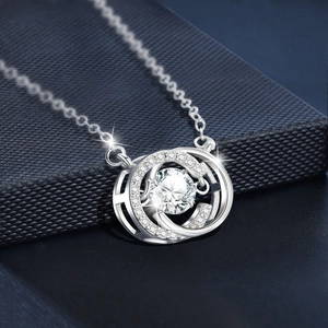 Sparkling S925 silver necklace featuring a dancing moissanite stone in a circular pendant