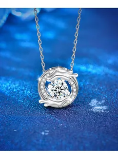 Detail showing 3EX cut 58 facets moissanite pendant on 925 silver dragon necklace