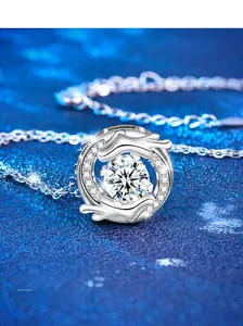 Close-up of S925 sterling silver dragon horn pendant with a sparkling round moissanite