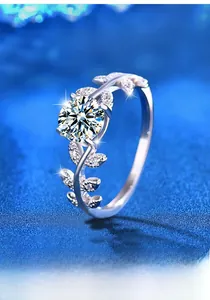 Detailed view of S925 silver ring featuring moissanite and laurel leaf design