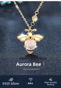 Macro detail of S925 silver bee necklace with purple moonstone and moissanite accents