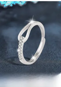 Macro view of S925 sterling silver stamp and sparkling moissanite stones on the open ring