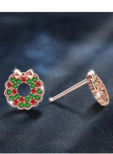 Macro detail of 925 sterling silver Christmas wreath stud earrings with S925 engraving