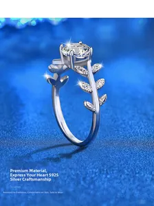 Close-up of S925 silver ring featuring a round moissanite and leaf-shaped side stones