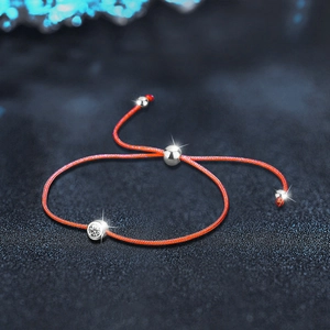 Adjustable red rope bracelet with Moissanite stone and 925 sterling silver beads