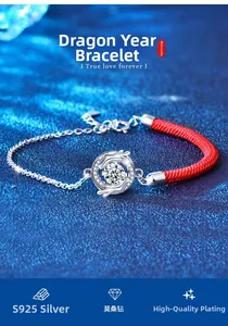 Detail of 925 sterling silver dragon bracelet with moissanite and red woven rope